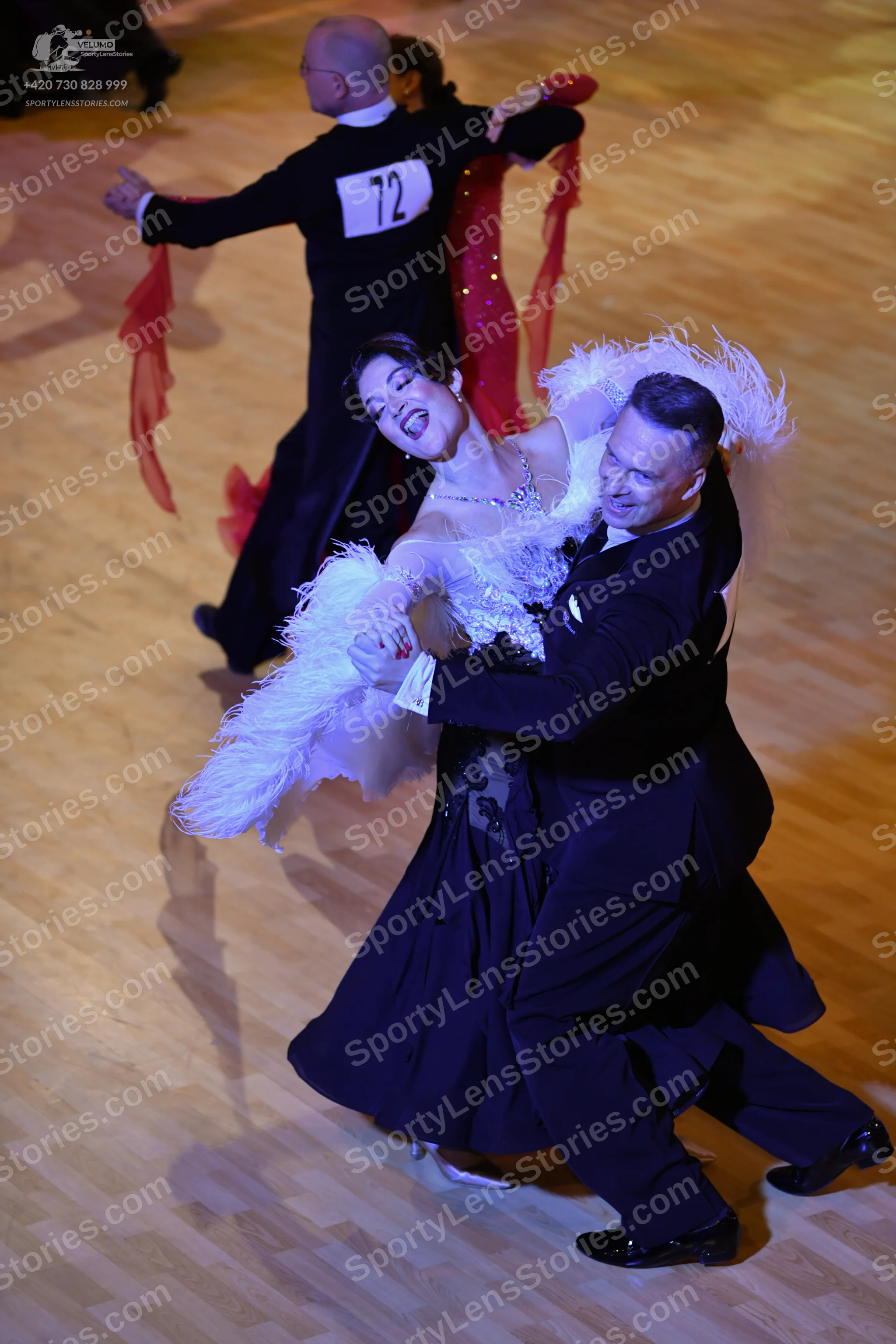 Dancesport competitor #12: ** Black tail suit with white sequin detailing on the lapels