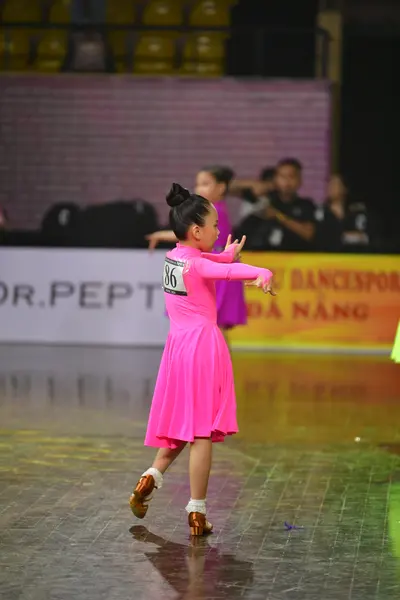 Dancesport competitor #806: Female dancer: pink long-sleeved latin dress