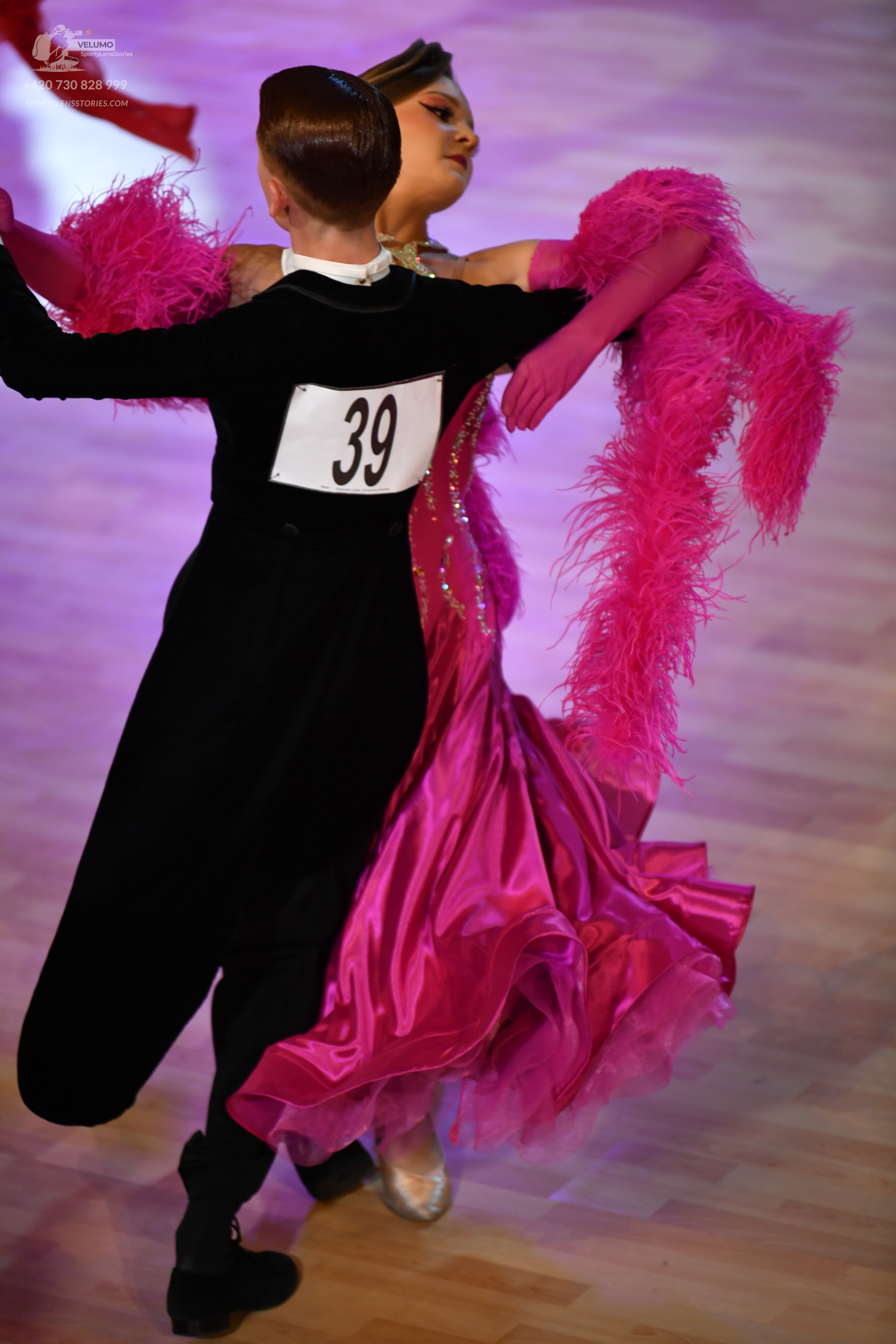 Dancesport competitor #39: Male**
*   **Color:** Black
*   **Fabric:** Sequin
*   **Style:** Tail suit
*   