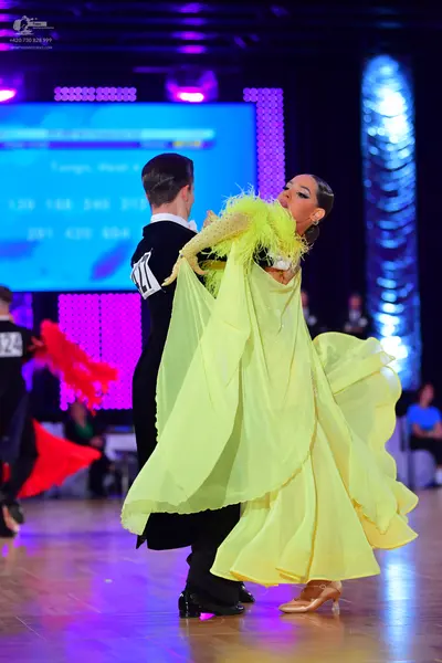 Dancesport competitor #24, #27: Male dancer: black suit