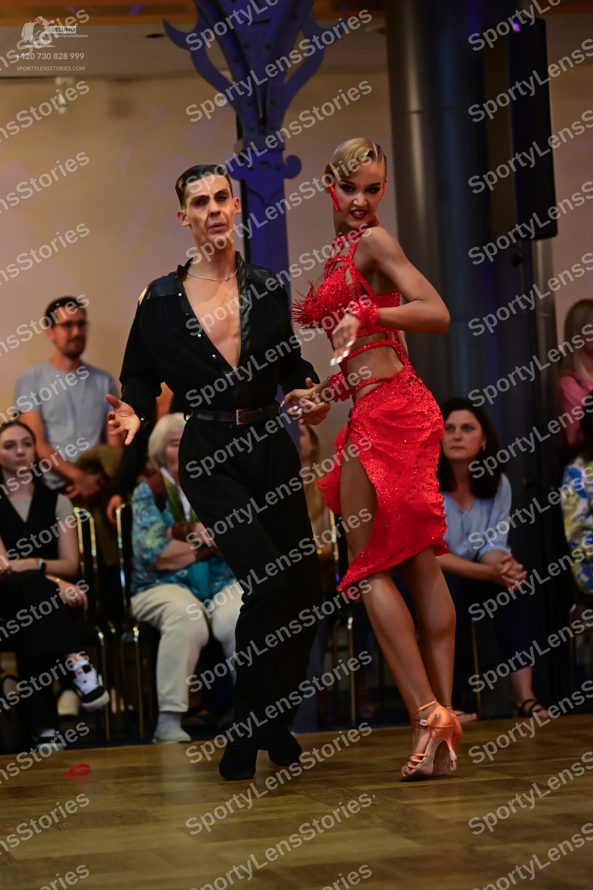Dancesport competitor: Male dancer: black shirt and black trousers