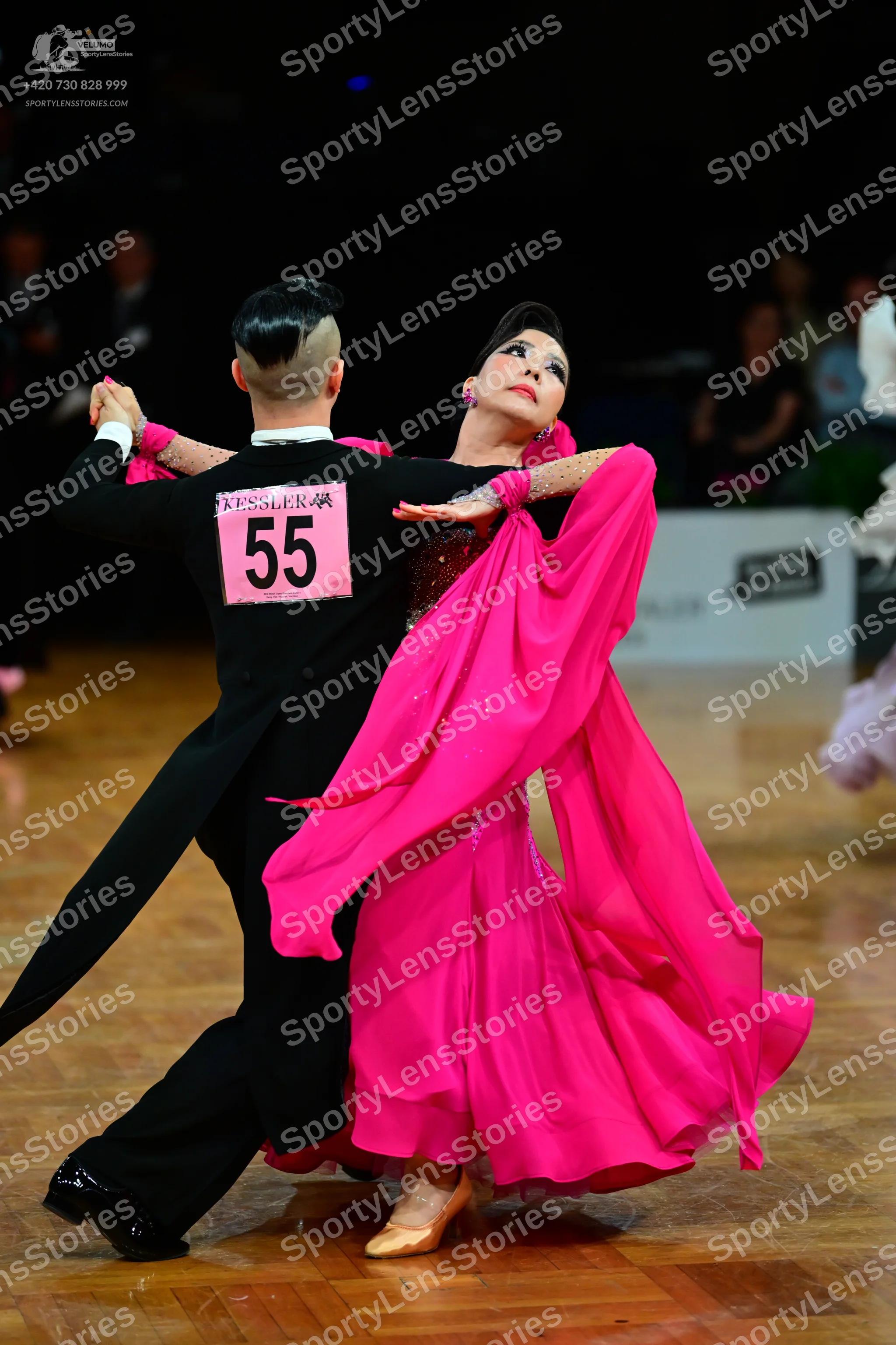 Dancesport competitor #55: Male dancer: black tailcoat suit with a white shirt collar