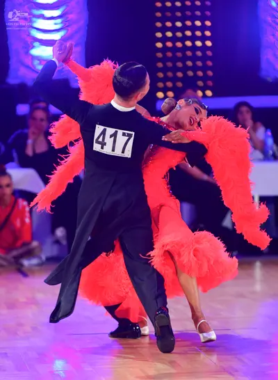 Dancesport competitor #417: Male dancer: black long-sleeved top and black trousers