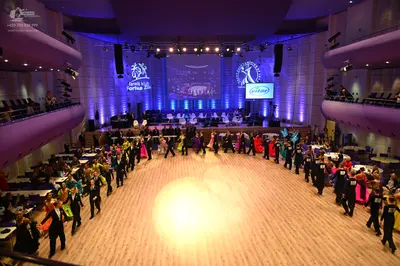 Dancesport competitor: Male dancers: black suits or tuxedo-style attire