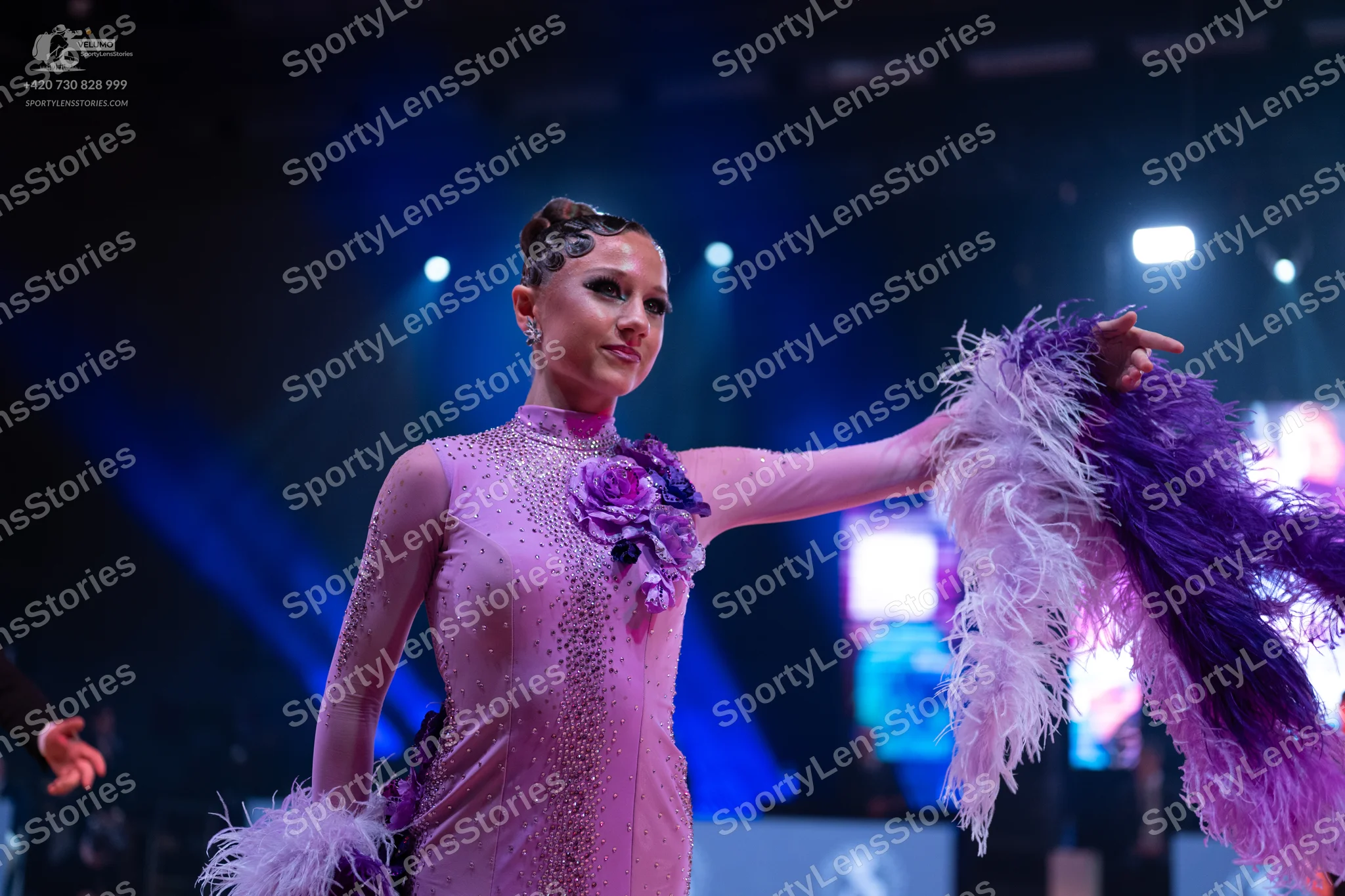 Dancesport competitor: Female dancer: light purple/lilac Latin dress with rhinestones or sequins, long
