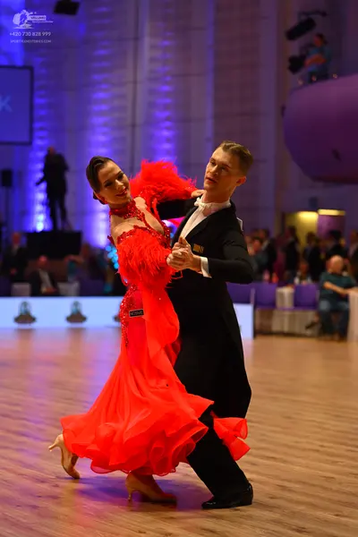Dancesport competitor: Male dancer: black suit