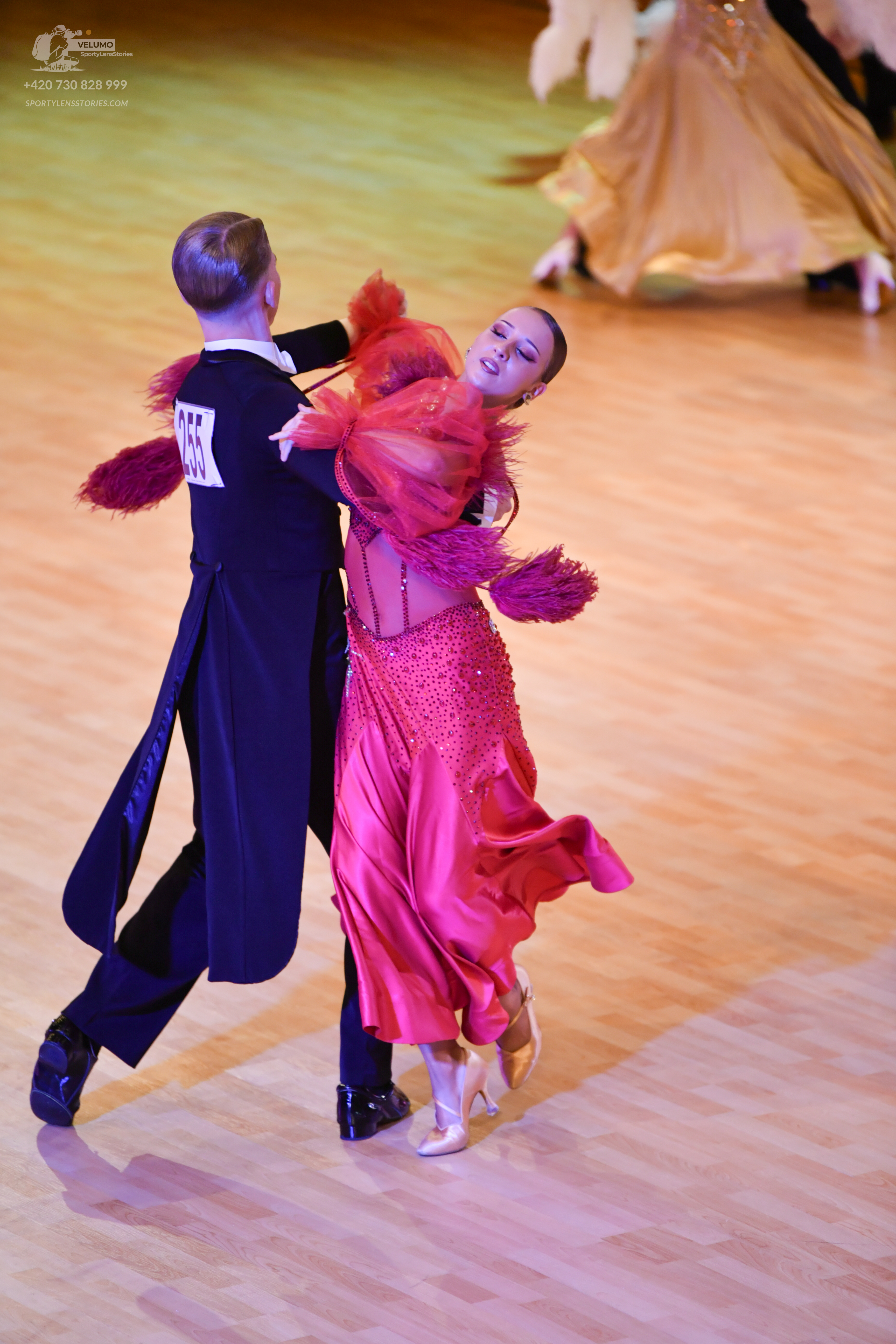 Dancesport competitor: Male**
*   **Color:** Black
*   **Fabric:** Sequin (primarily black sequins cove