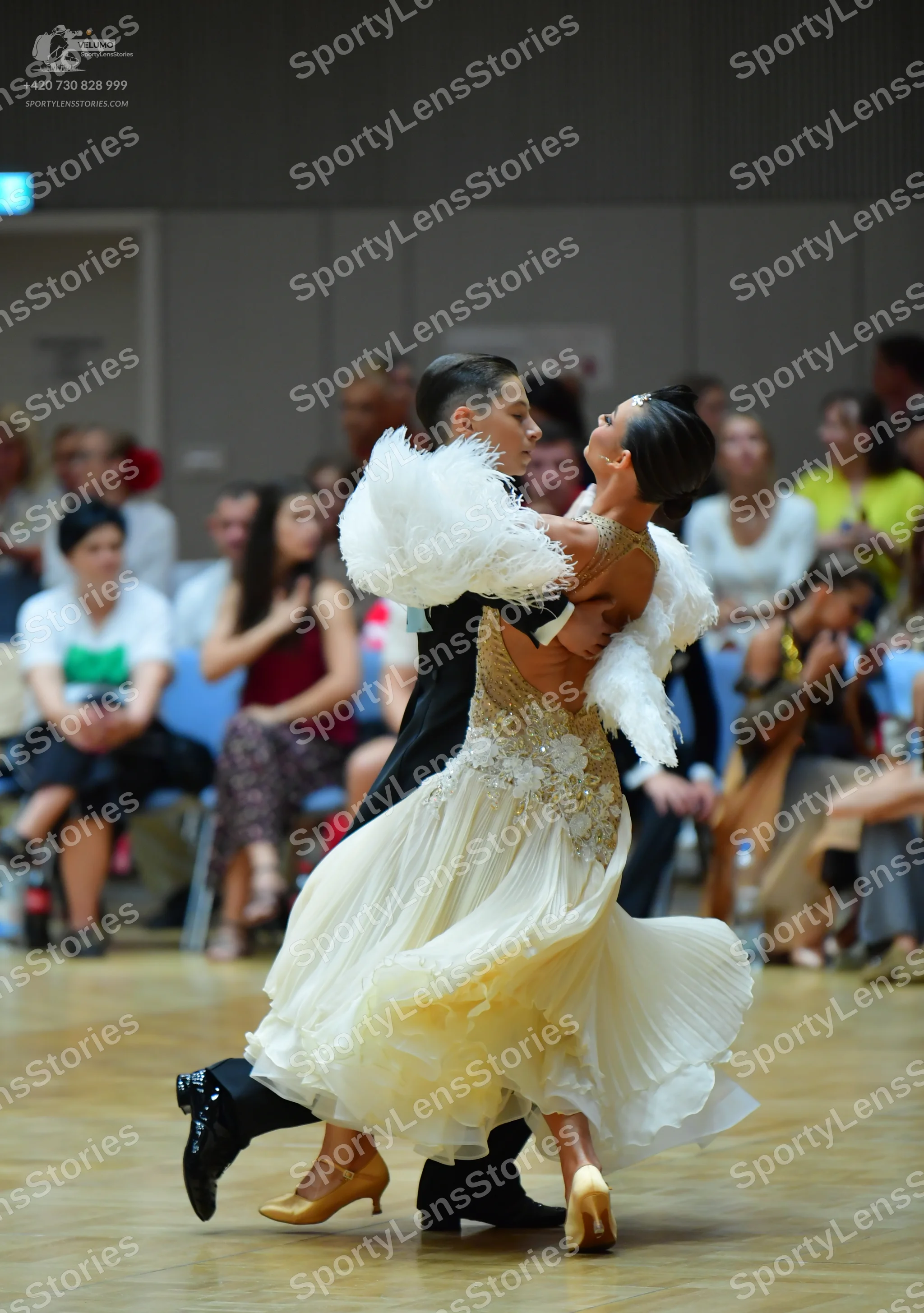 Dancesport competitor: Male dancer: black ballroom suit with black trousers and black dance shoes