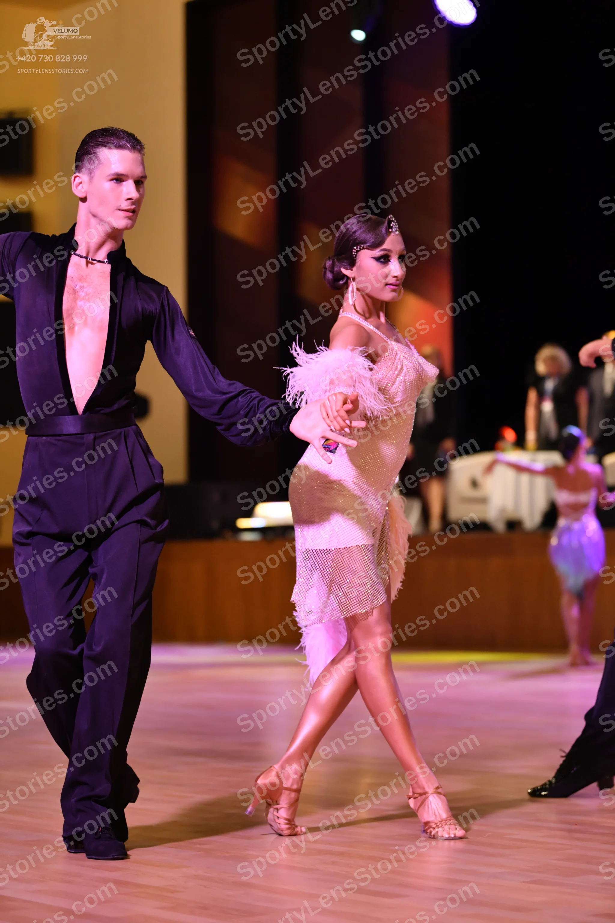 Dancesport competitor: ** 

**Male Dancer:**  Black tailsuit with a sequin lapel