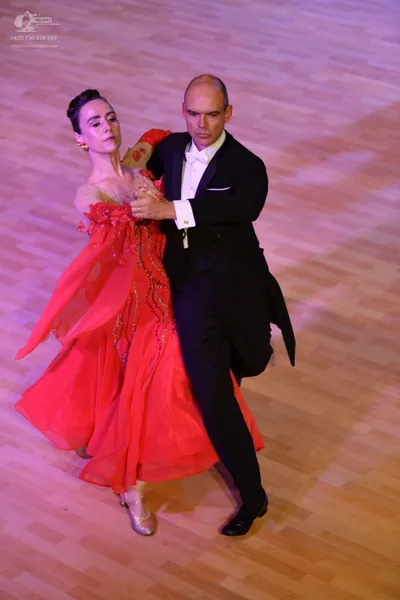 Dancesport competitor: ** Male: Black tail suit with satin lapels and a satin waistcoat