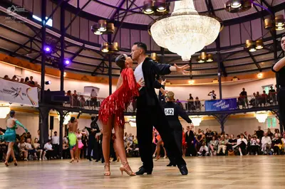 Dancesport competitor #142: Male dancer: black suit with white shirt