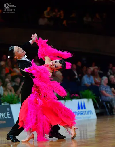Dancesport competitor: Male dancer: black suit, white shirt, and black dance shoes
