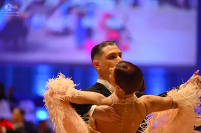 Dancesport competitor: Male dancer: black suit