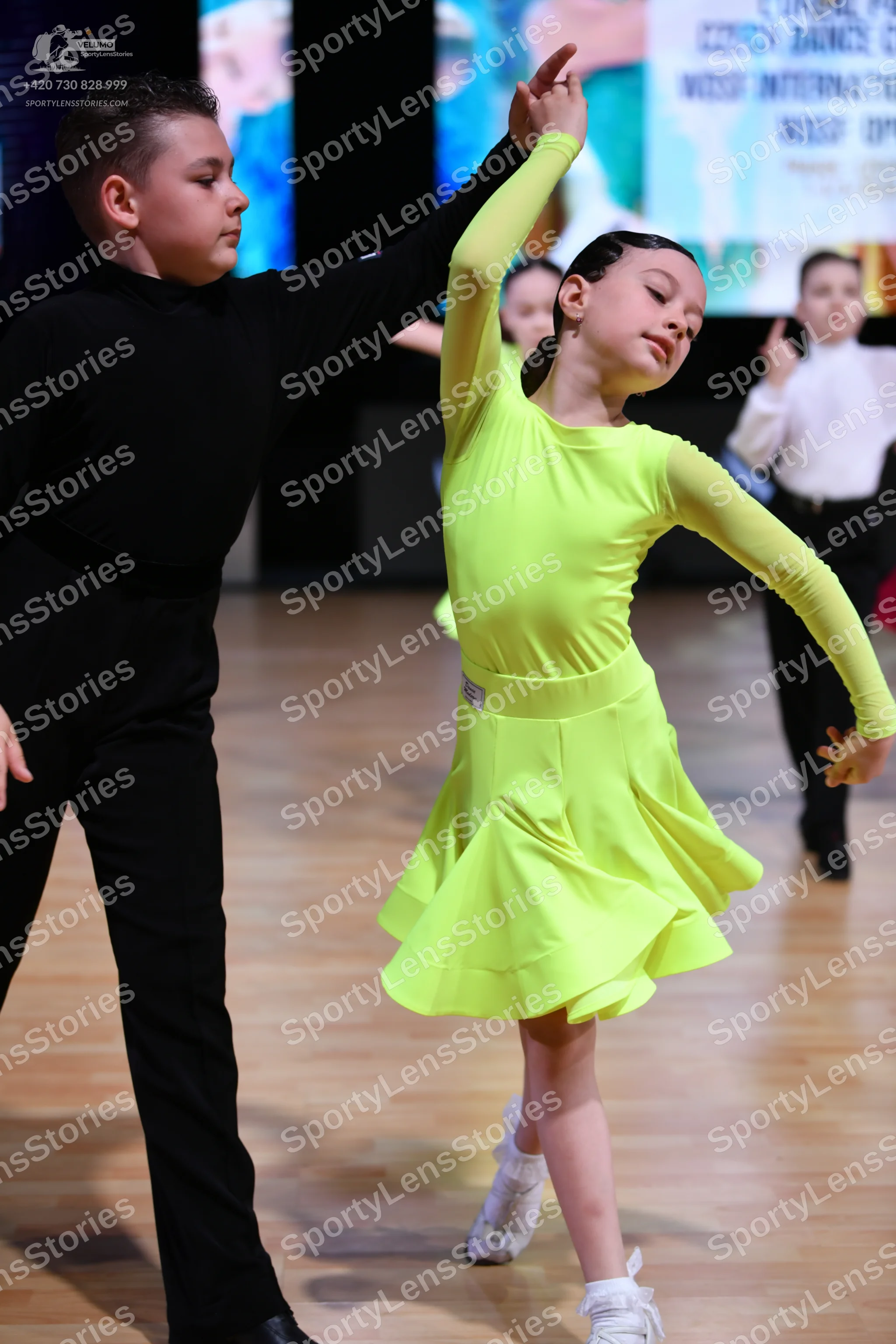 Dancesport competitor: Male dancer: black long-sleeved shirt and black trousers