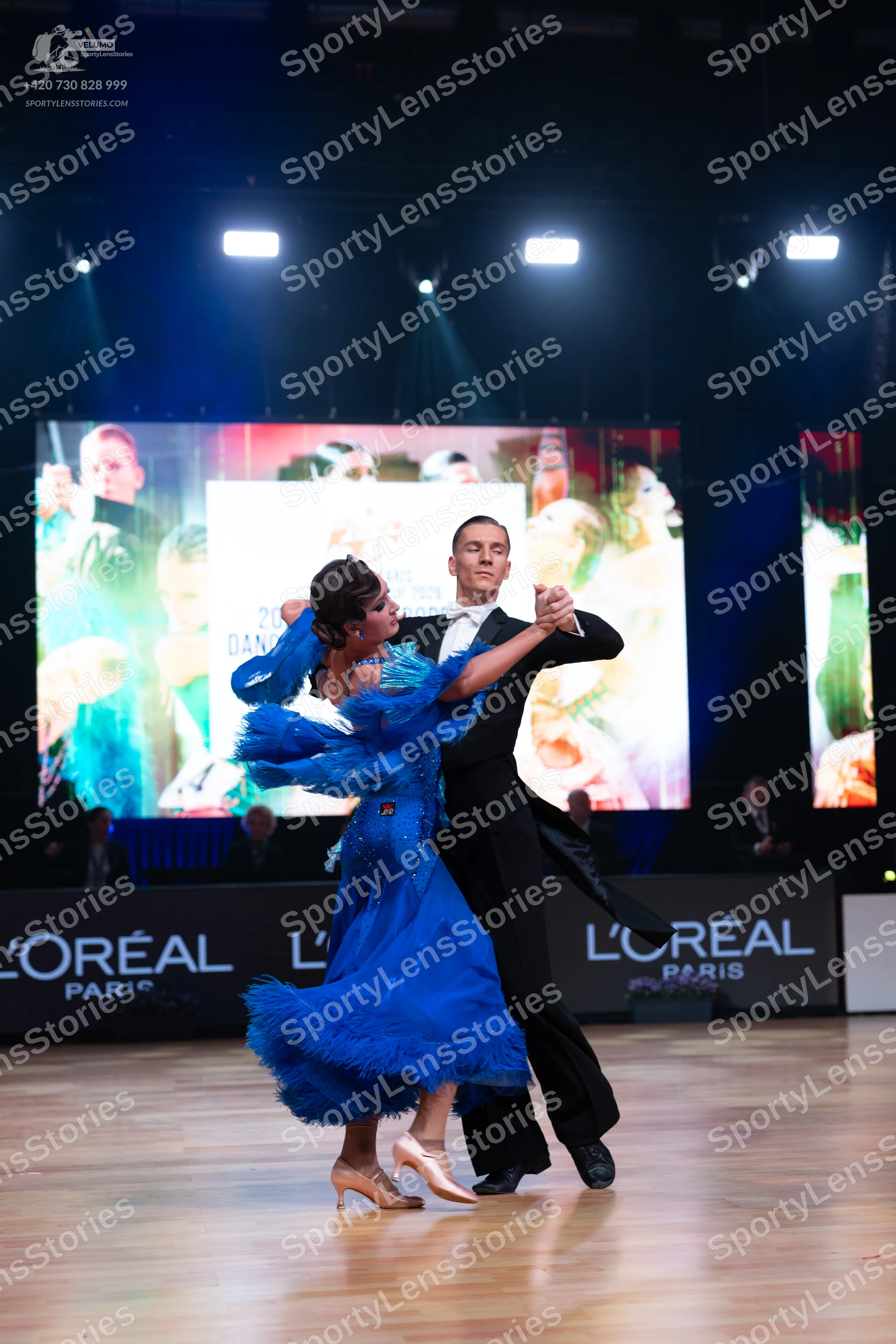Dancesport competitor: Male dancer: black tailcoat suit with a white shirt and black bow tie