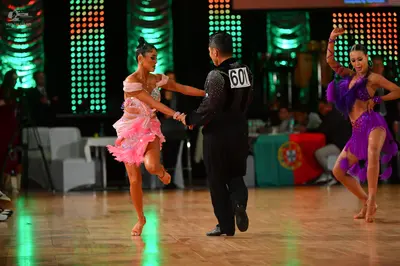 Dancesport competitor #601: Male dancer: black dance outfit with sequins on the back