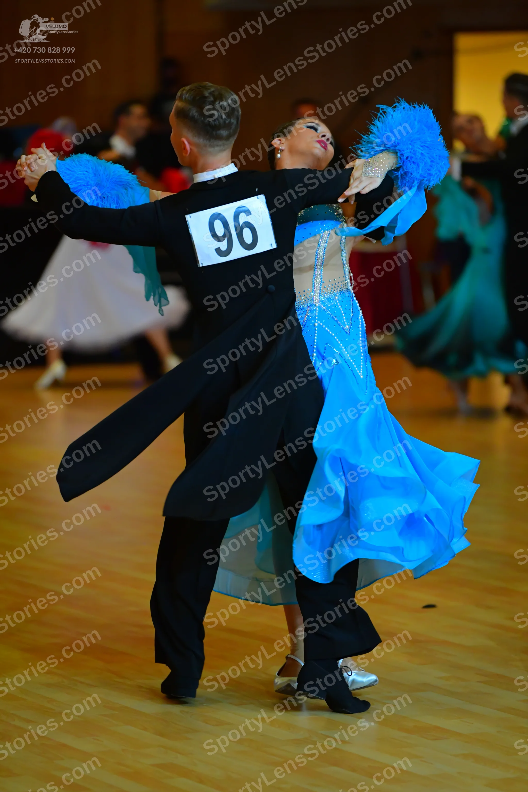 Dancesport competitor #96: ** Male: Black tail suit with a subtle, dark gray sequin lapel