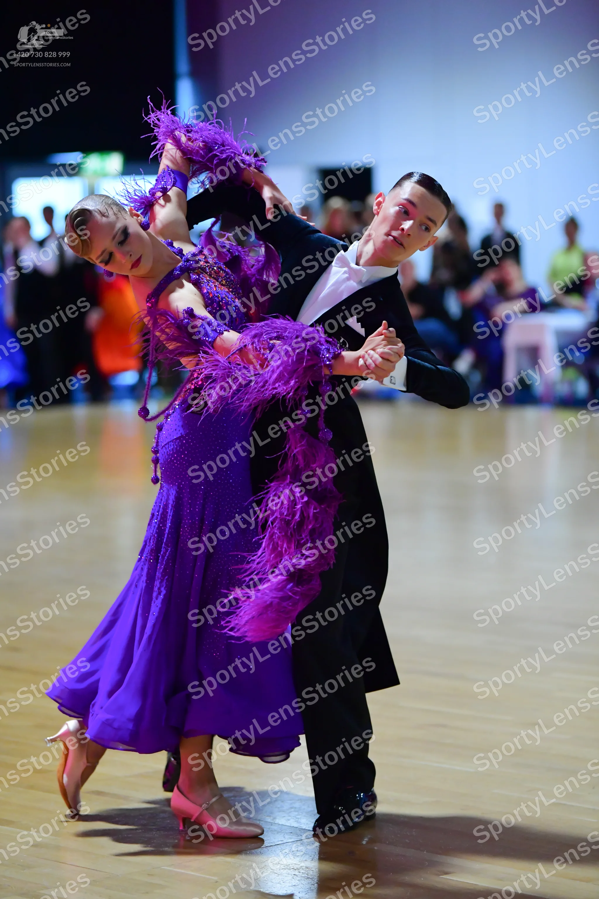 Dancesport competitor: Male dancer: black tailcoat, white shirt, white waistcoat, black trousers, and b