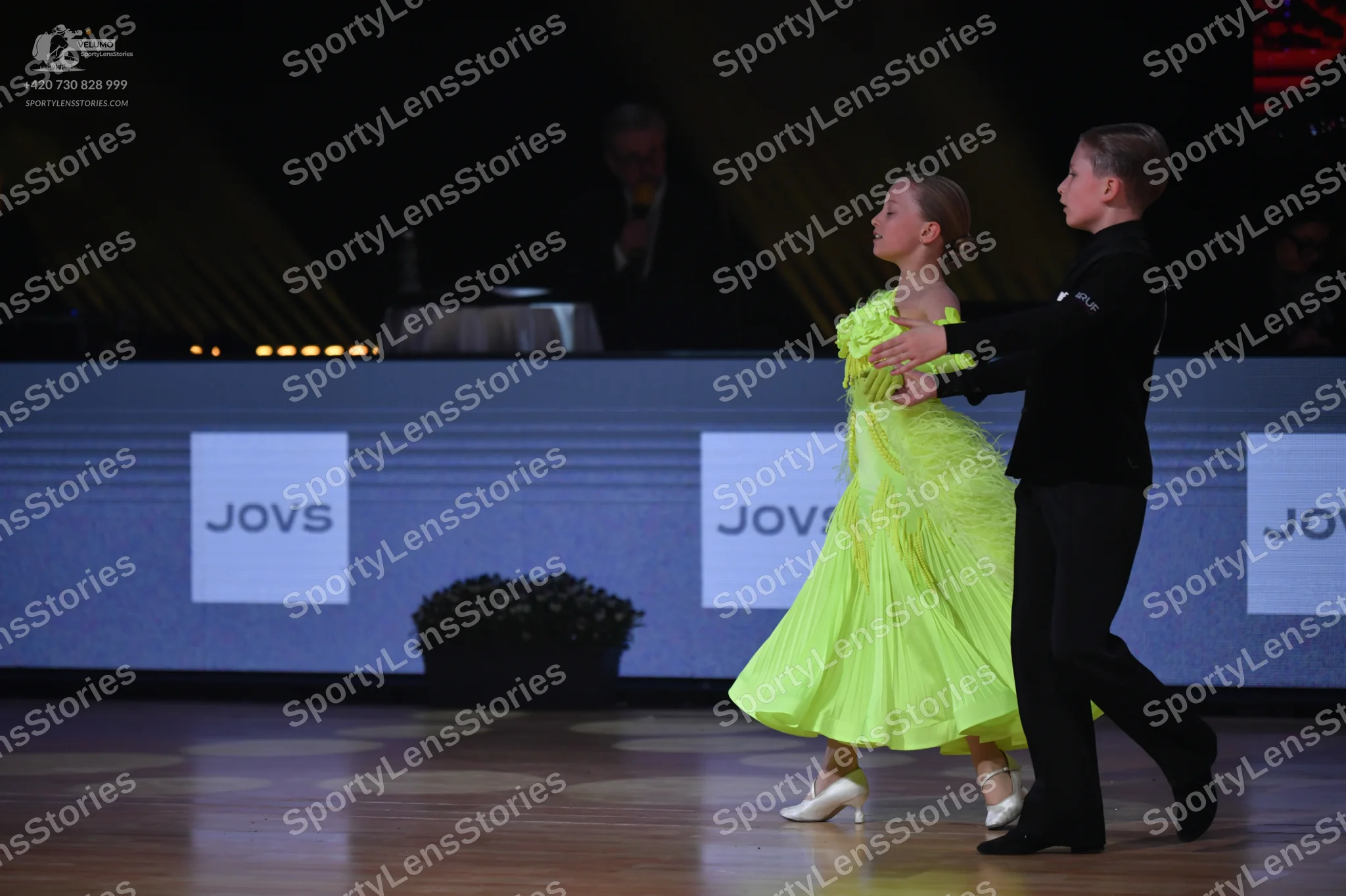 Dancesport competitor: Male dancer: black suit and trousers with black dance shoes