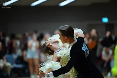 Dancesport competitor: Male dancer: black suit