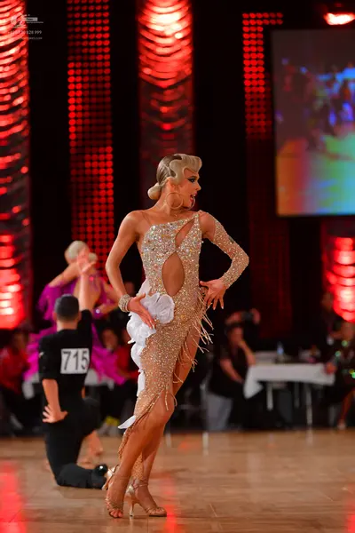 Dancesport competitor #715: Male dancer: black shirt and trousers