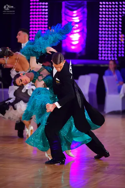 Dancesport competitor #65: Male dancer: black suit