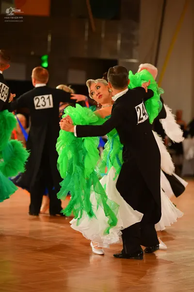 Dancesport competitor #469, #231: Male dancers: black suits
