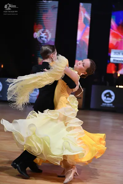 Dancesport competitor: Male dancer: black suit