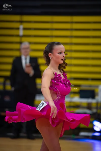 Dancesport competitor: ** Female: Hot Pink Latin Dress 999
*   **Color:** Hot Pink
*   **Fabric:**  App