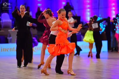 Dancesport competitor: Male dancer: black trousers and black shirt