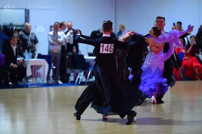 Dancesport competitor #146: Male dancer: black suit