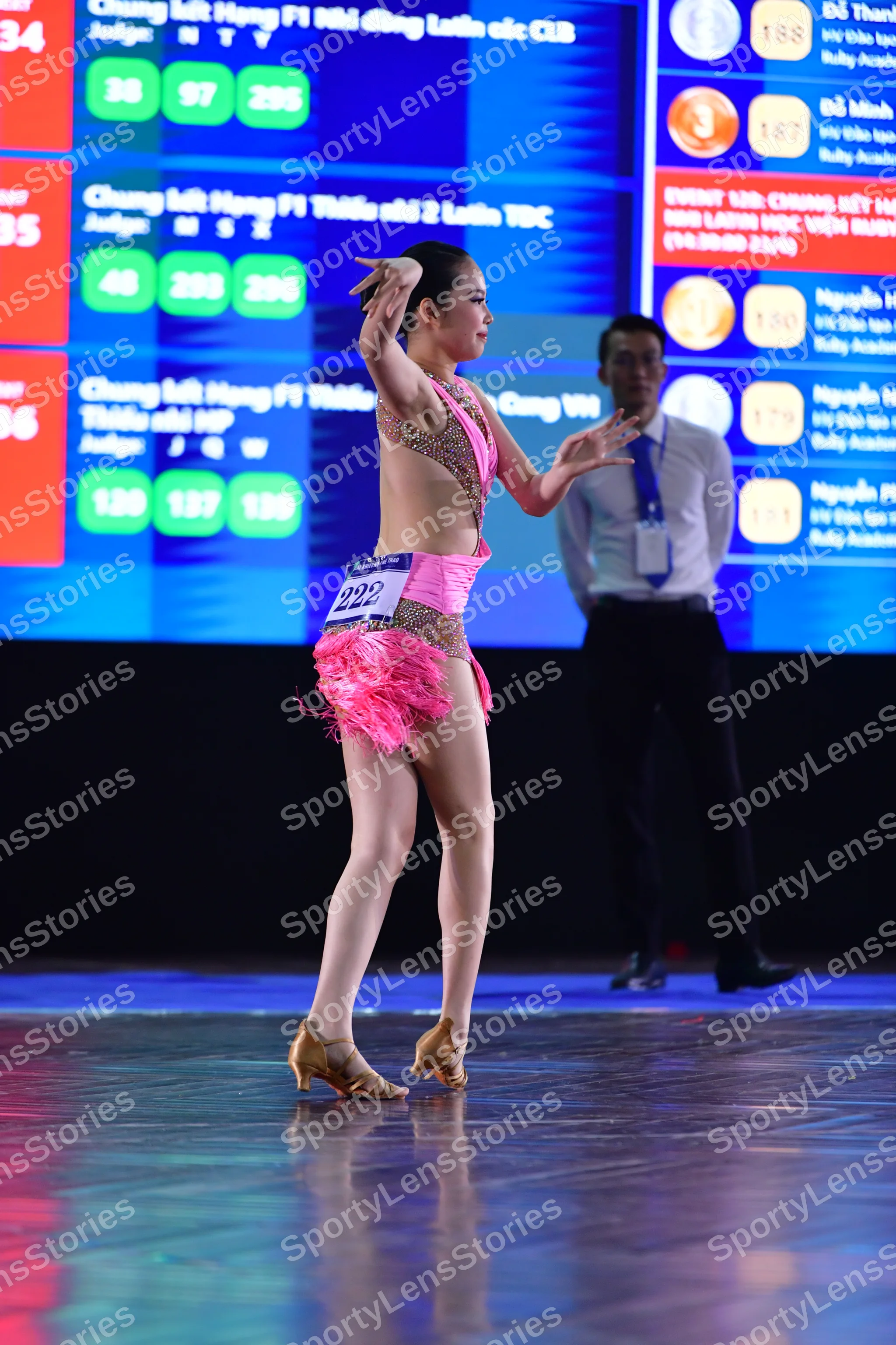 Dancesport competitor: ** Black tailsuit
*   **Fabric:** Appears to be a satin or similar smooth fabric