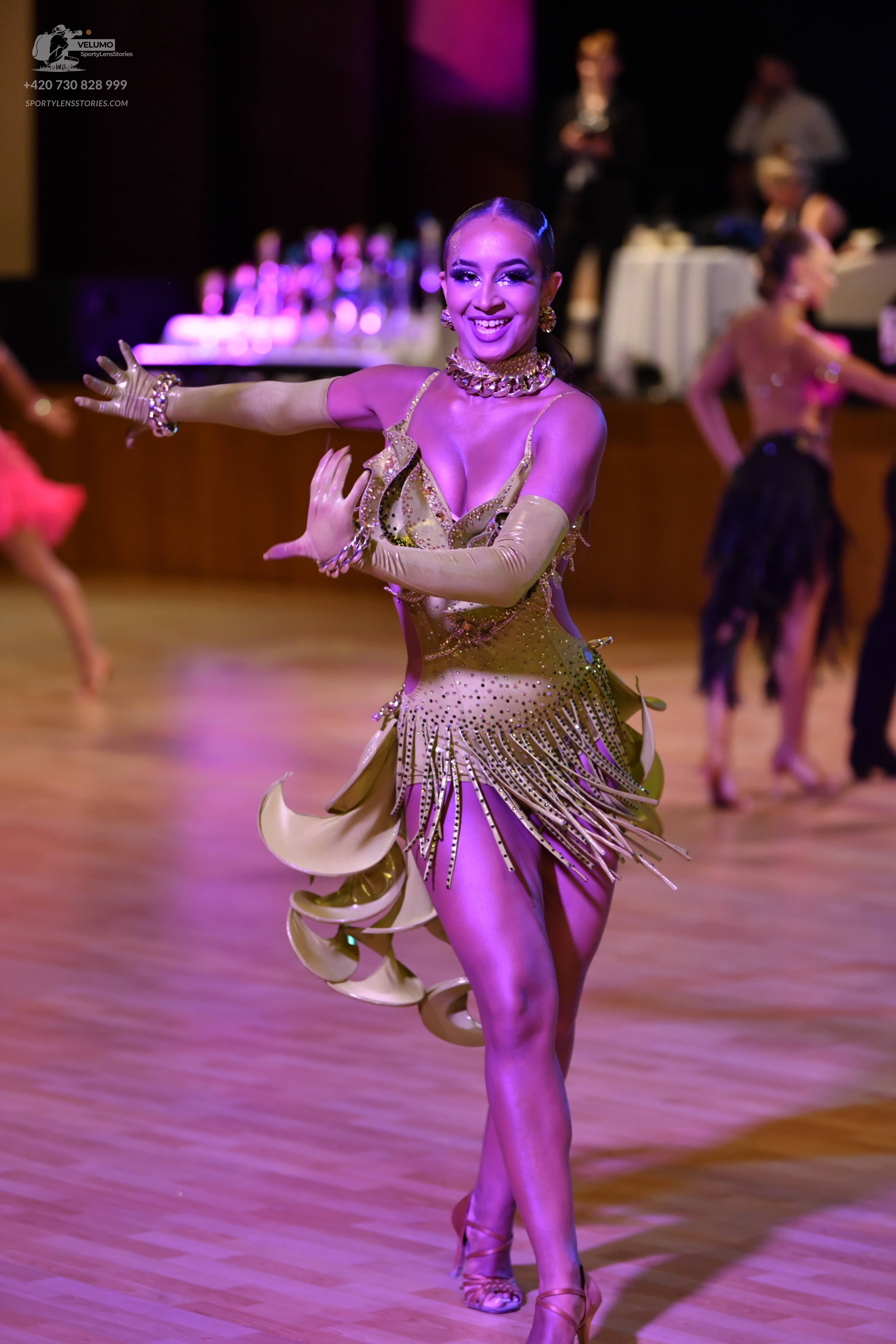 Dancesport competitor: ** Gold/Champagne Latin Dress