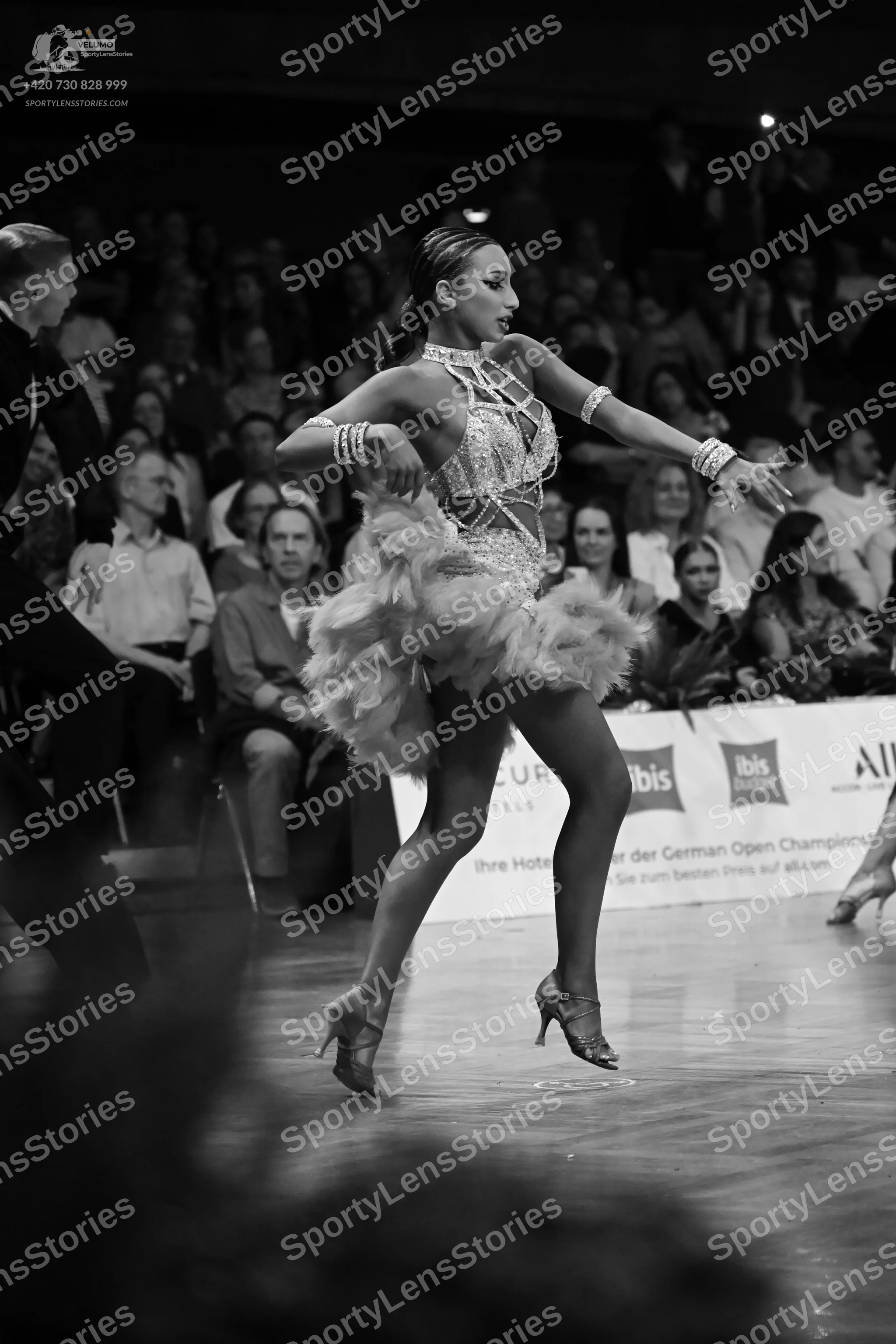Dancesport competitor: Male dancer: black suit