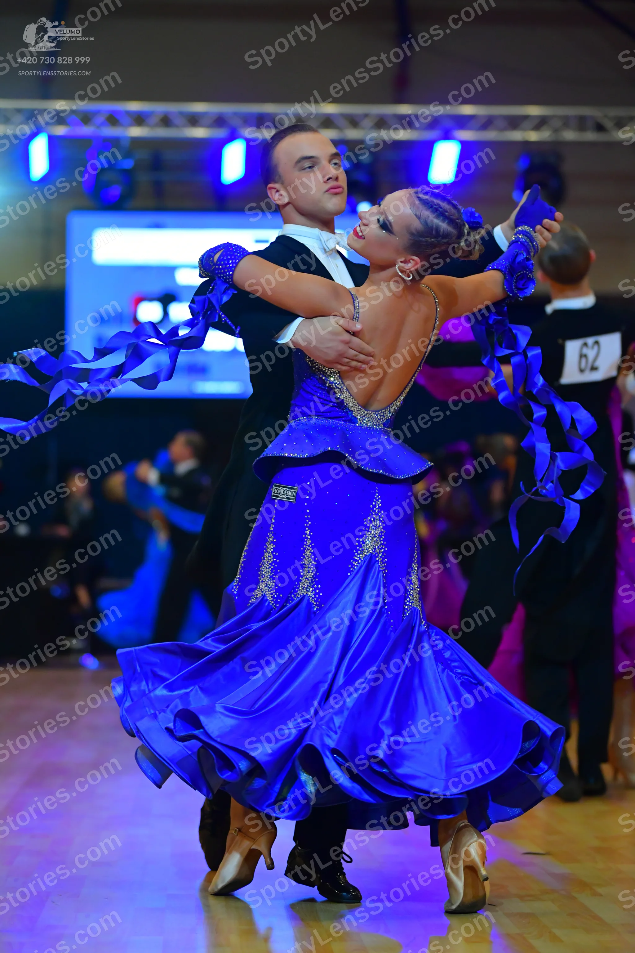 Dancesport competitor #62: Male dancer: black suit with a white shirt and bowtie