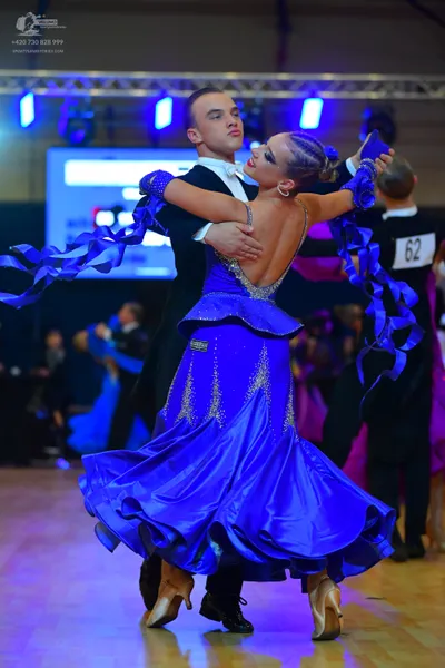 Dancesport competitor #62: Male dancer: black suit with a white shirt and bowtie