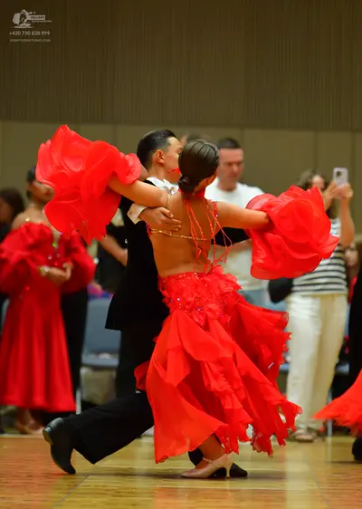 Dancesport competitor: Male dancer: black suit