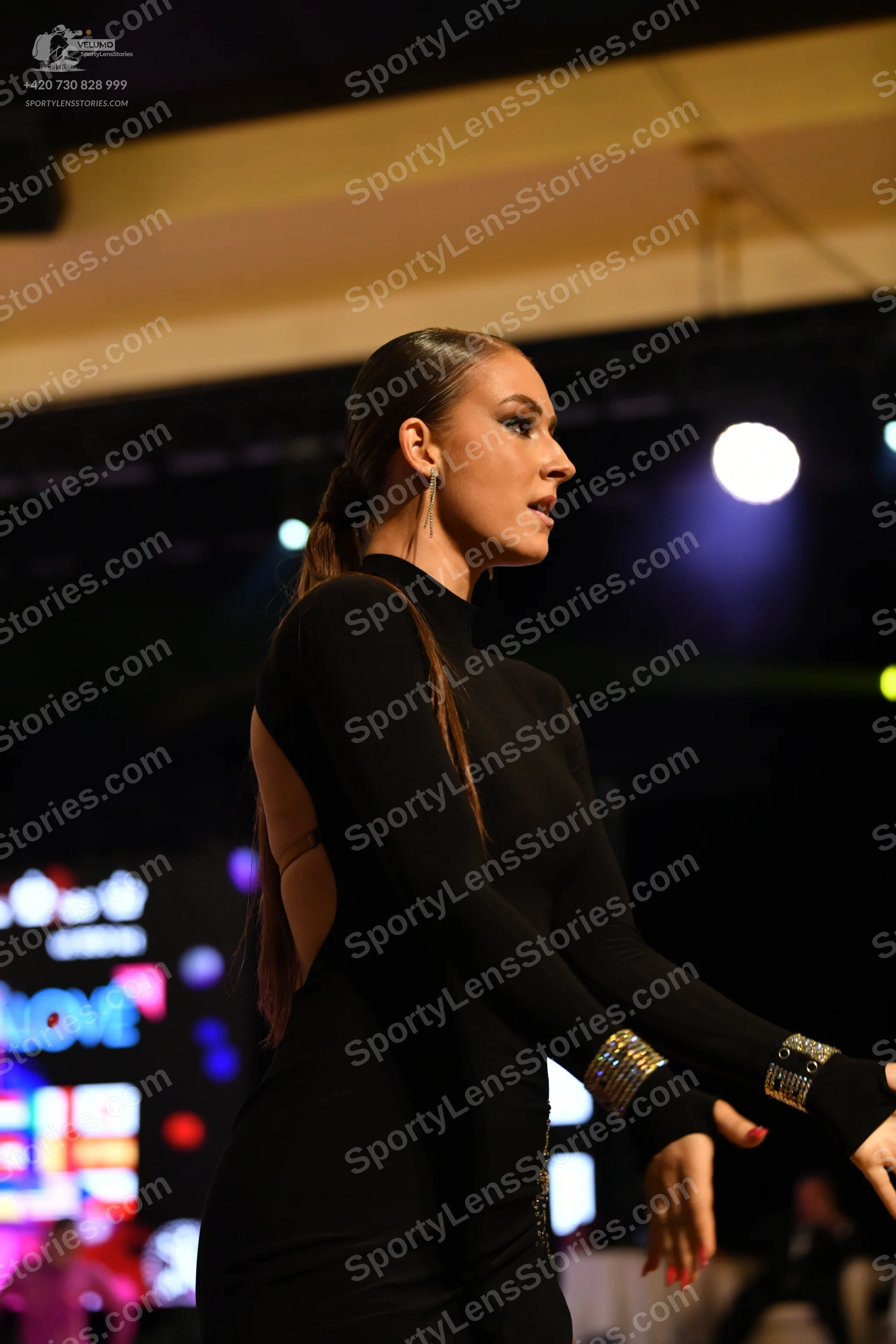Dancesport competitor: ** Female
*   **Color:** Primarily black