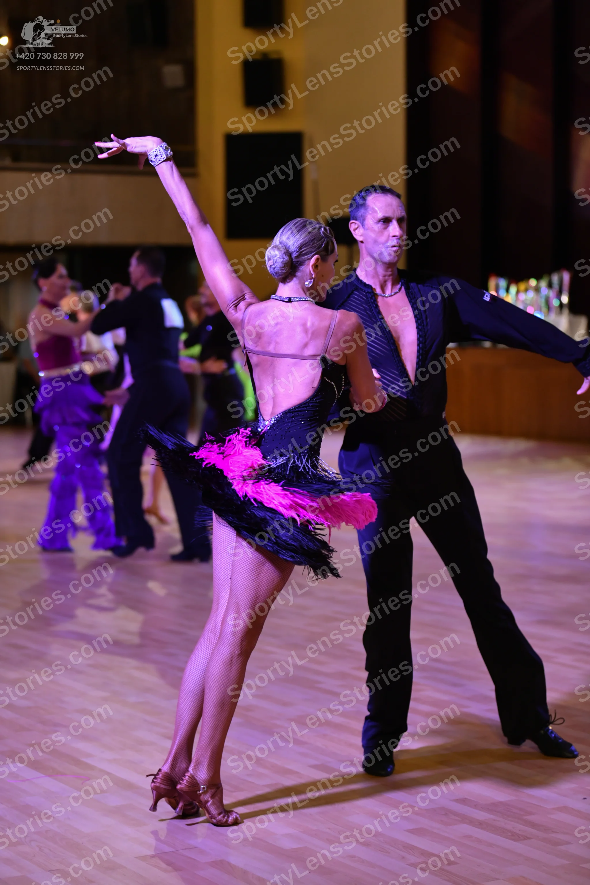 Dancesport competitor: ** Black tailsuit