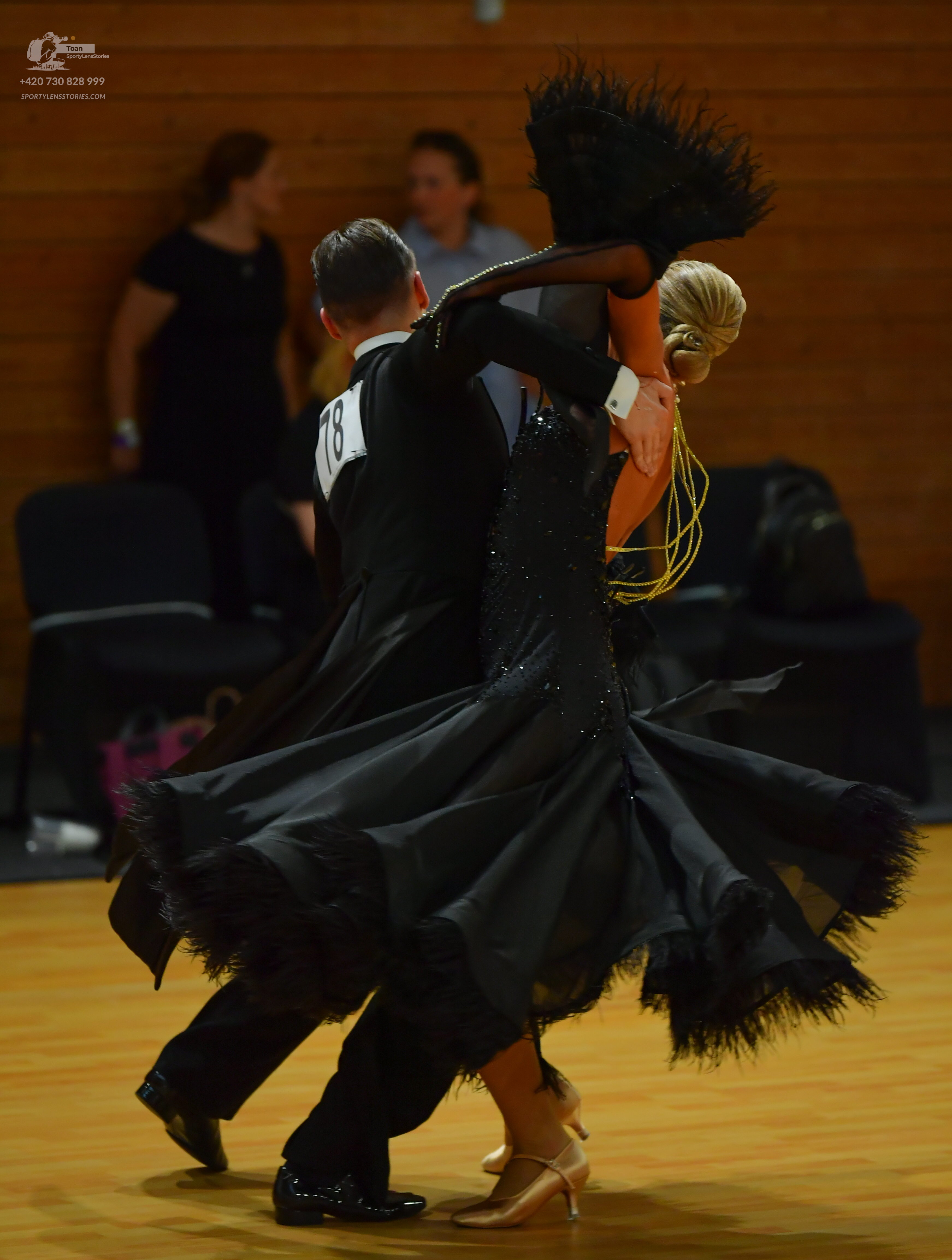 Dancesport competitor: ** Black ballroom suit