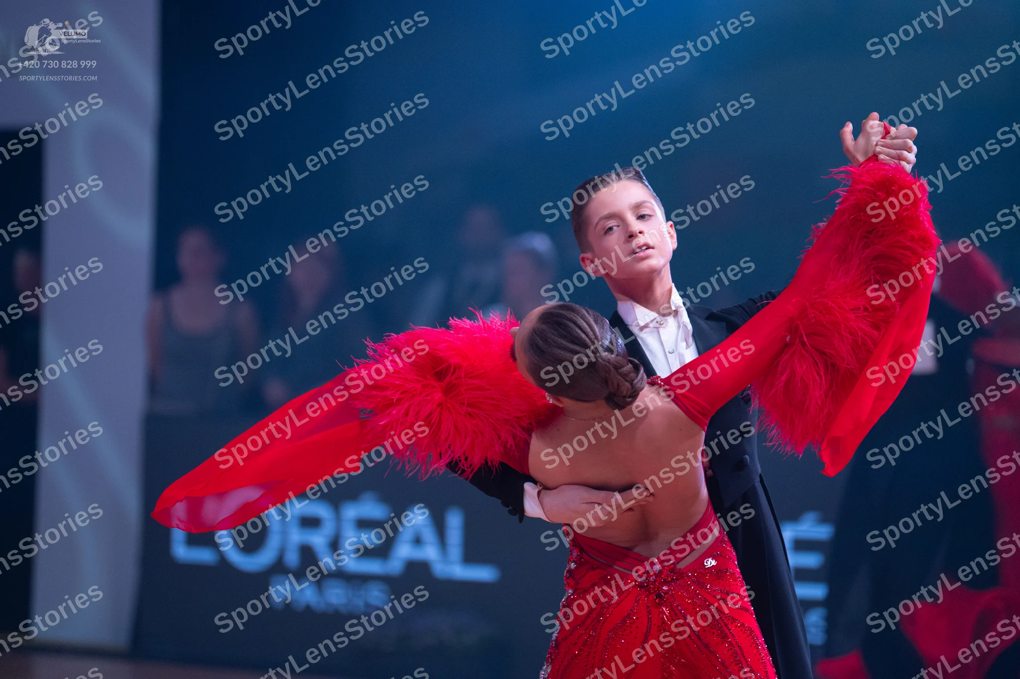 Dancesport competitor: Male dancer: black suit with a white shirt