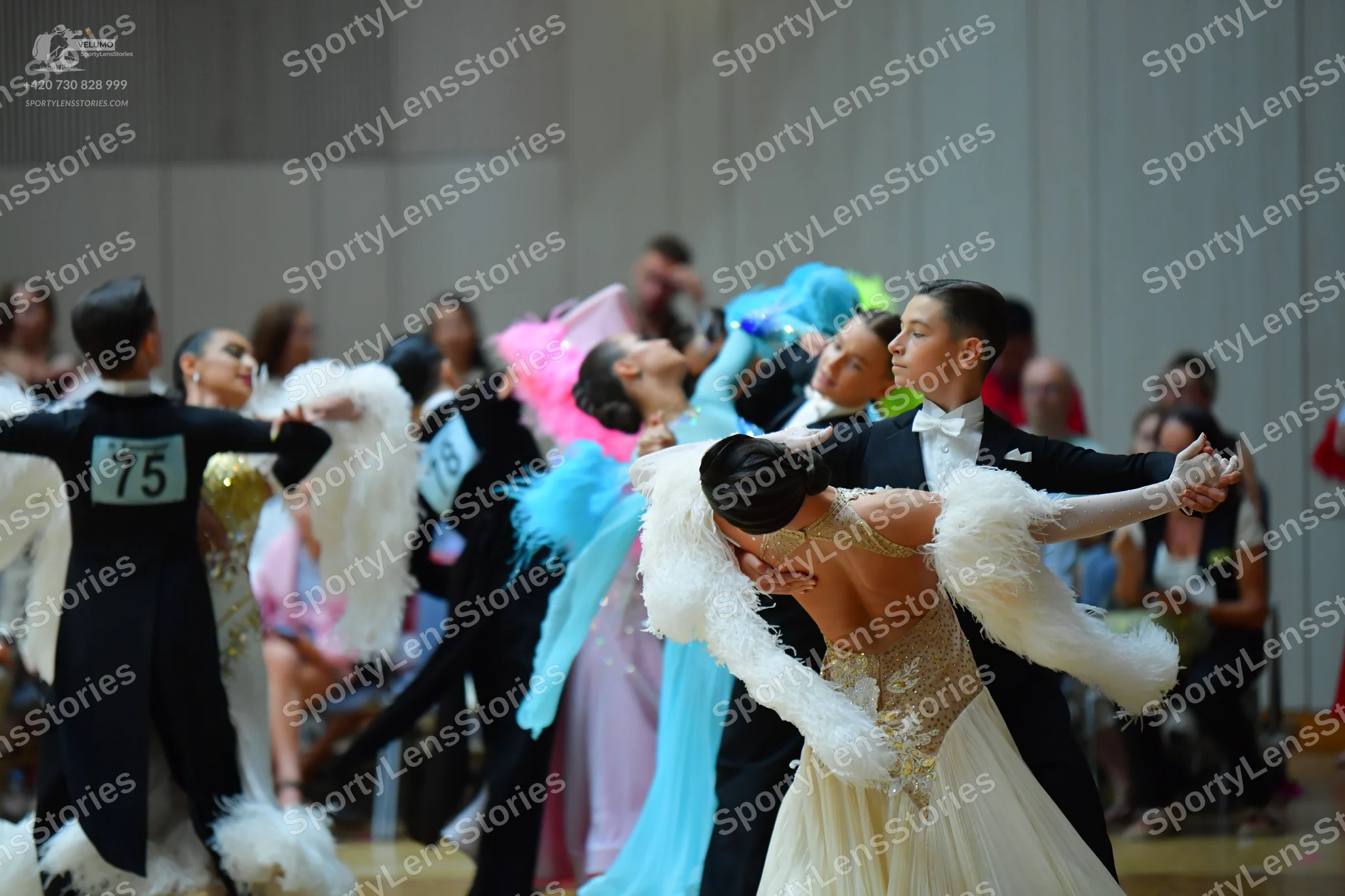 Dancesport competitor #75, #73: Male dancers: black suits, one with a white shirt and white bow tie