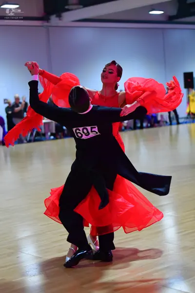 Dancesport competitor #695: Male dancer: black suit