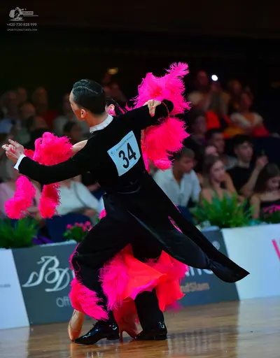 Dancesport competitor #34: Male dancer: black long-sleeved top and black trousers