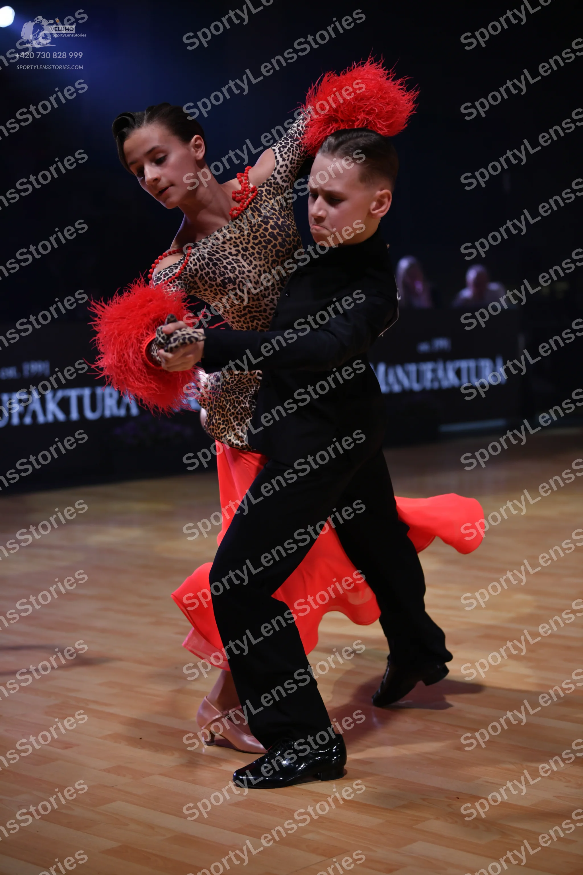 Dancesport competitor: Male dancer: black long-sleeved dance shirt and black trousers