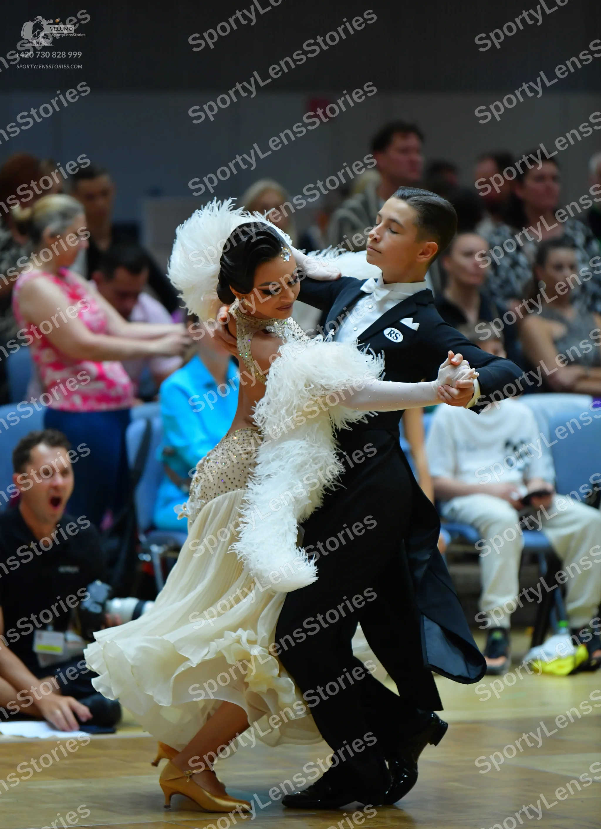 Dancesport competitor #145: Male dancer: black formal dance suit with a white shirt and white bowtie