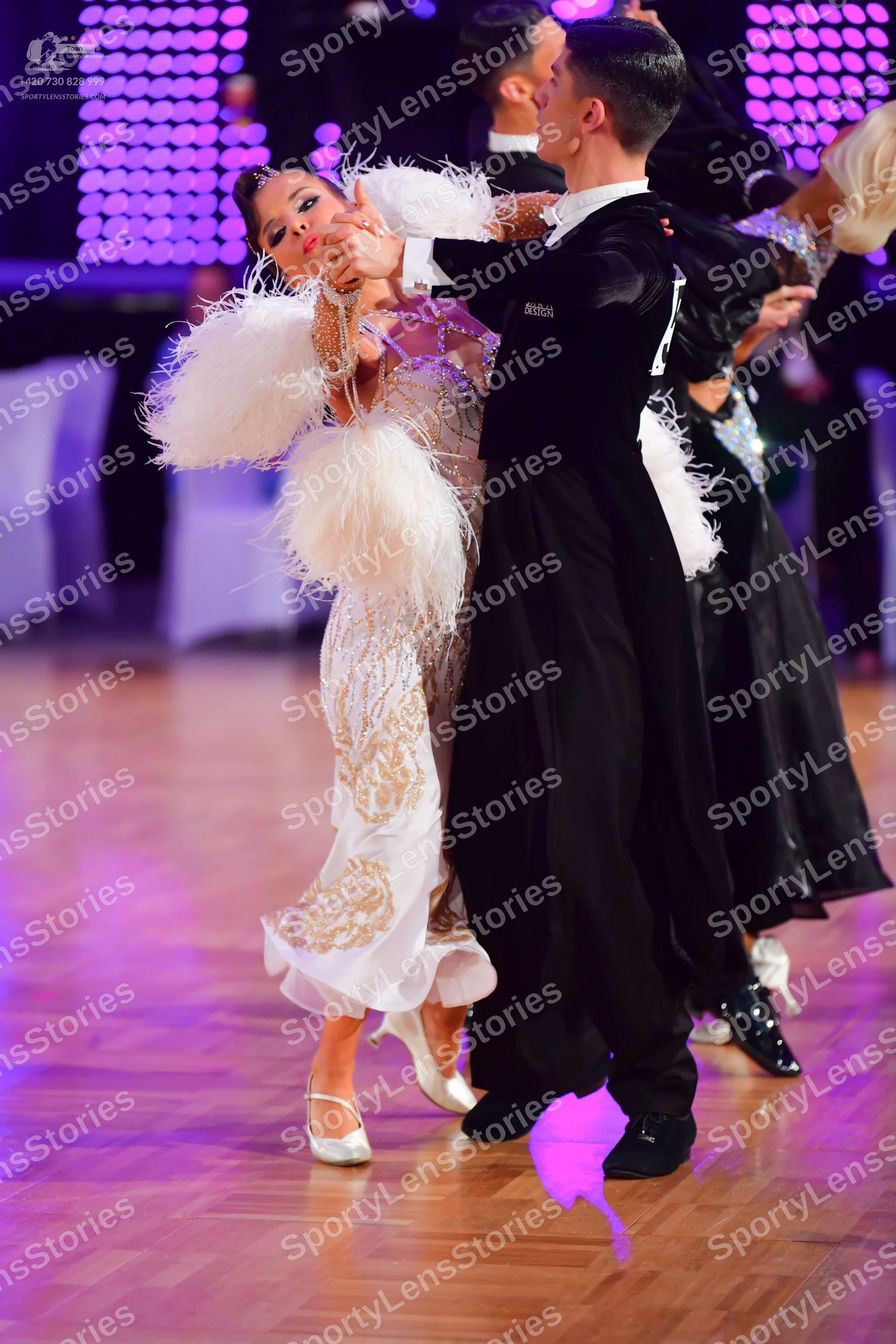 Dancesport competitor: Male dancer: black suit