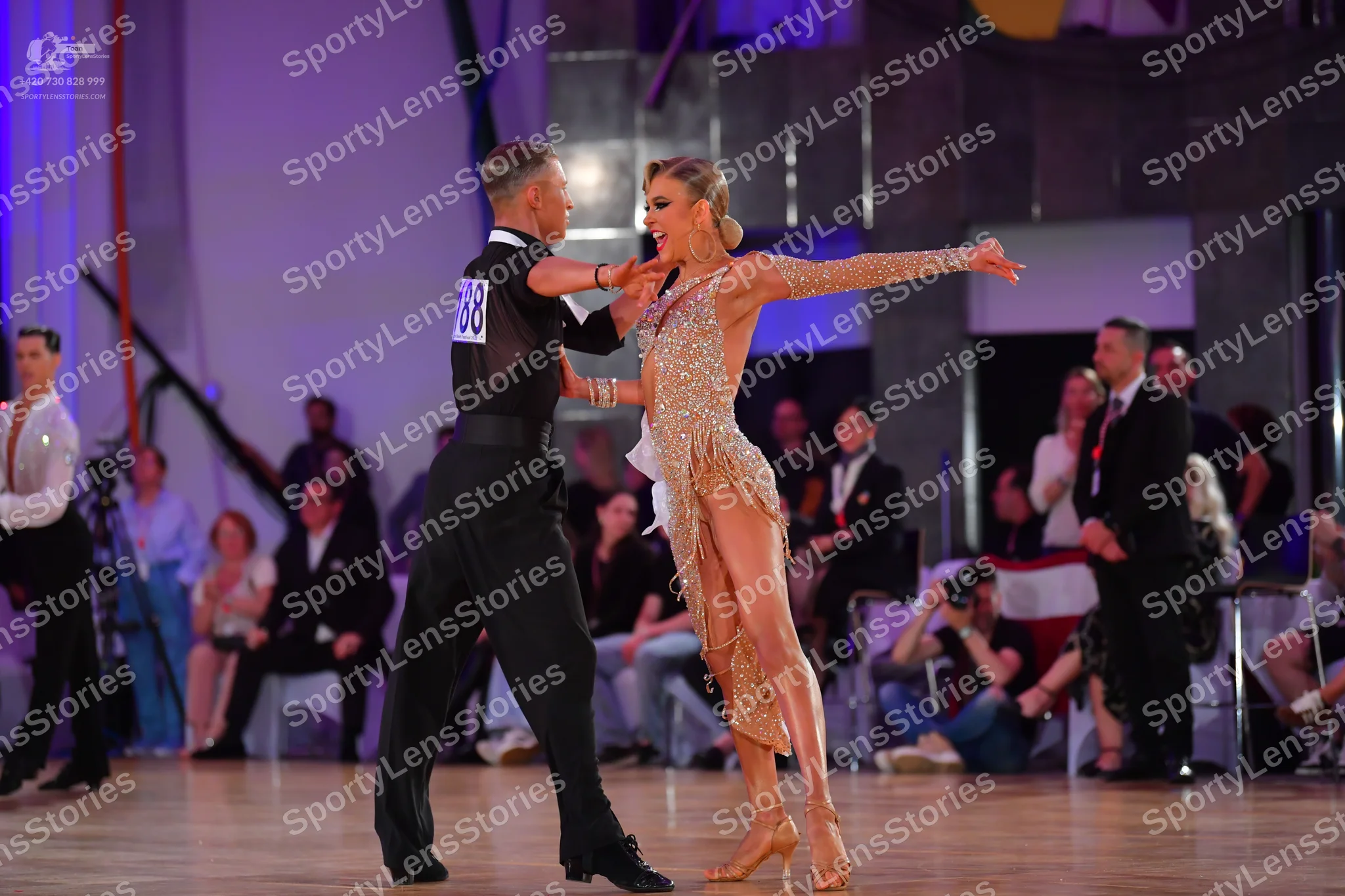 Dancesport competitor: Male dancer: black long-sleeved shirt and black trousers