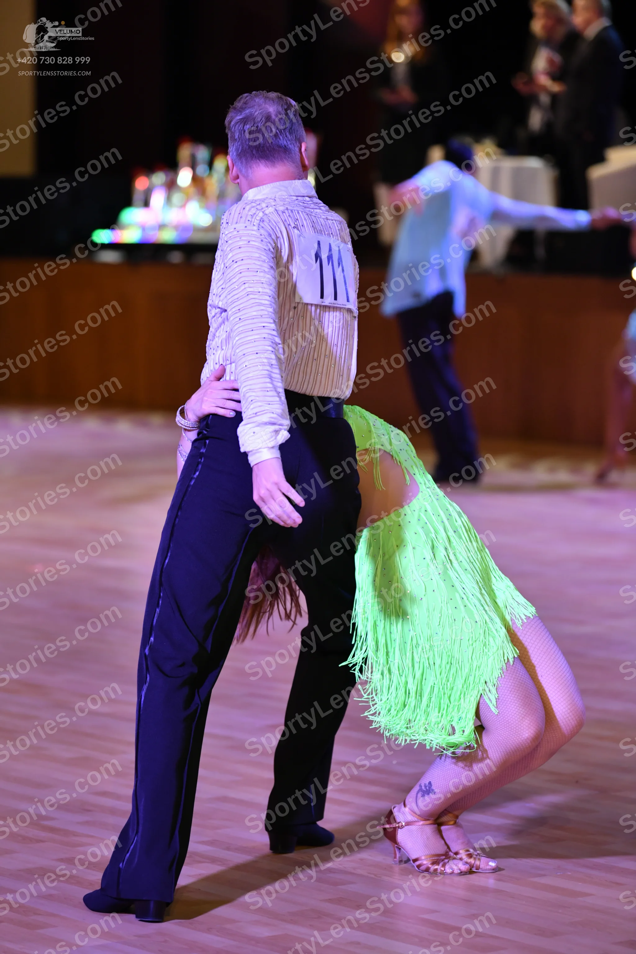 Dancesport competitor: ** Black tail suit