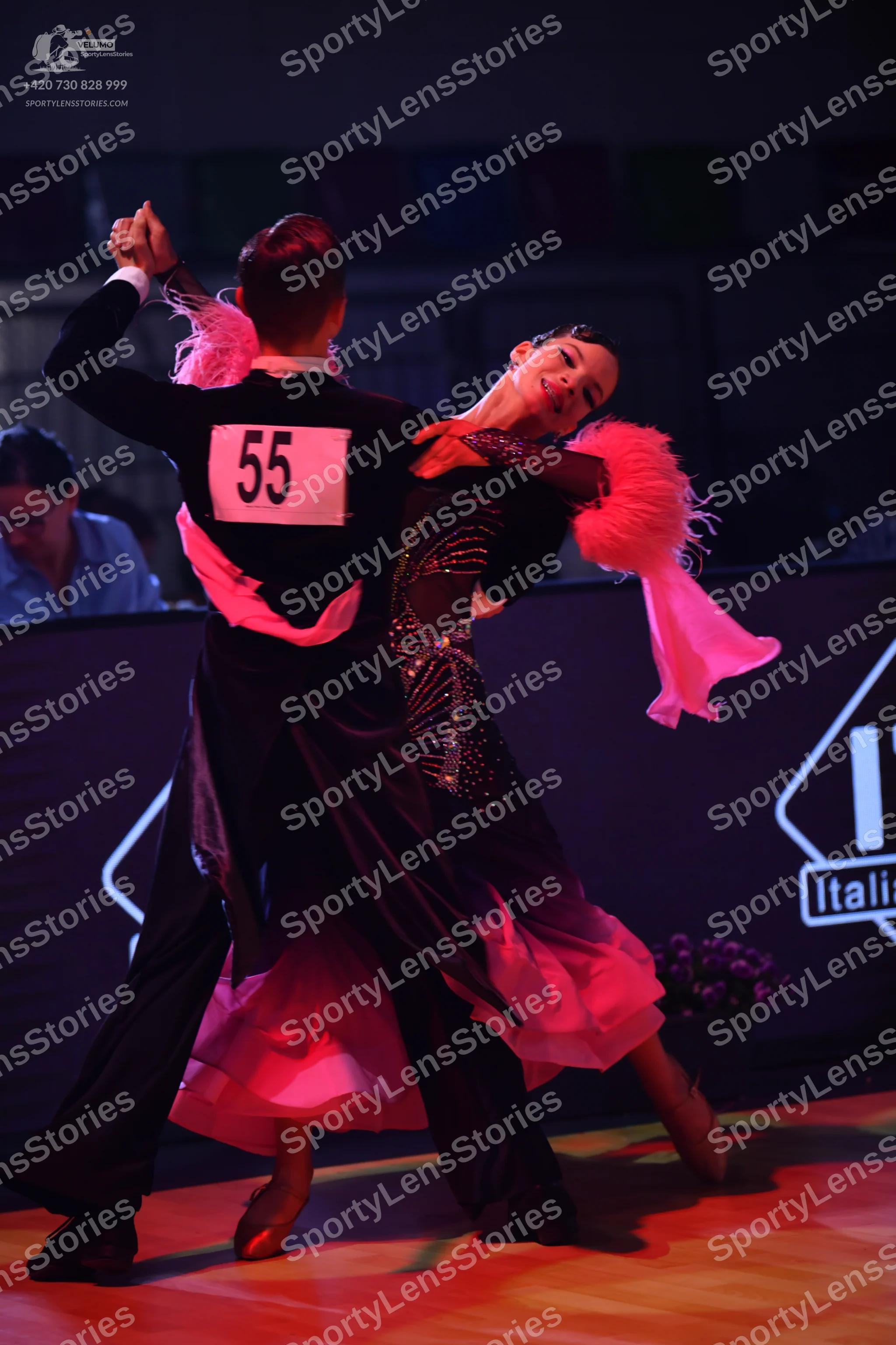 Dancesport competitor: Male dancer: black long-sleeved shirt and black trousers